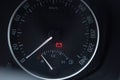 Close up shot of a car dashboard with the battery icon lit. Royalty Free Stock Photo