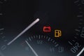 Close up shot of a car dashboard with the battery icon lit. Royalty Free Stock Photo