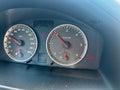 Close-up shot of a car's dashboard with the battery icon lit. Royalty Free Stock Photo