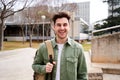 Close up shot of cheerful happy caucasian teenage boy looking at camera smiling. Funny portrait of a young Royalty Free Stock Photo