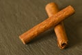 Close-up shot of cinnamon sticks on wooden tabletop Royalty Free Stock Photo