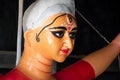 Close up shot of clay idol of Goddess Devi Durga, before upcoming Durga Puja at a potter`s studio in Kolkata