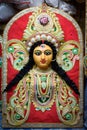 Close up shot of clay idol of Goddess Devi Durga, before upcoming Durga Puja at a potter`s studio in Kolkata