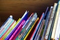 Close-up shot of colorful child books on a shelf