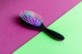 Close up shot of a colorful hairbrush. Concept Royalty Free Stock Photo