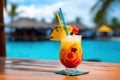 A close-up shot of a colorful tropical cocktail on a beachside bar