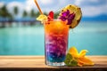 A close-up shot of a colorful tropical cocktail on a beachside bar