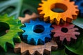 Close-up shot of colorful wooden gears interlocking on lush green foliage