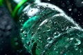 A close-up shot of condensation forming on a chilled bottle of mineral water, creating a sense of coolness and refreshment.