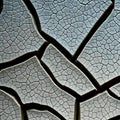 A close-up shot of a cracked ceramic surface, revealing intricate patterns and textures4, Generative AI