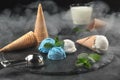 Close-up shot of a creamy and blueberry ice cream served on a dark slate, black background. Royalty Free Stock Photo