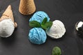 Close-up shot of a creamy and blueberry ice cream served on a dark slate, black background. Royalty Free Stock Photo