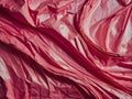 Close-up shot of a crumpled pink plastic bag