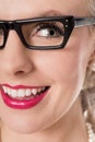 Close up shot of cute studious girl wearing spectacles, isolated