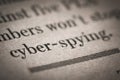 Close up shot of a cyber spying text written newspaper Royalty Free Stock Photo
