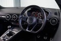 a close up of a dashboard and steering wheel in a car Royalty Free Stock Photo