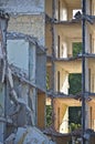 Close-up shot of demolished residential building with the outside walls missing