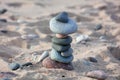 Different pebbles stacked in the beach