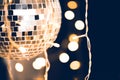 close-up shot of disco ball with garland Royalty Free Stock Photo