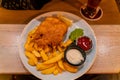 Close up shot of a dish of fish and chips Royalty Free Stock Photo
