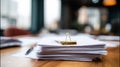 Stack of paper documents with gold clip on wooden table Royalty Free Stock Photo