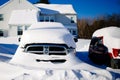 Close-up shot of Dodge 4x4 trucks covered in snow