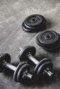 close-up shot of dumbbells with weight plates