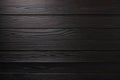 A close-up shot of ebony wood with dark and moody lighting Royalty Free Stock Photo