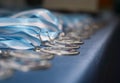 Close-up shot of an endless line of medals with Argentinian flags