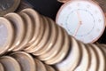 Close-up shot of euro coins and watch dial Royalty Free Stock Photo