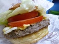 Close up shot of a fast food hamburger