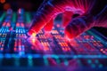 Gloved hand interacting with a futuristic glowing digital interface showing complex data in red and blue. Royalty Free Stock Photo