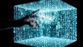 Hand Interacting with a Digital Cube of Binary Code Royalty Free Stock Photo