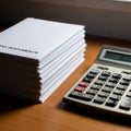 Stack of Tax Documents with Calculator Royalty Free Stock Photo