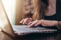 Close-up shot of female hands typing on laptop keyboard Royalty Free Stock Photo