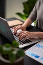 Close up shot of females hands typing on laptop at home offeice Royalty Free Stock Photo