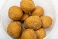 Finely Crushed Peanut Chikki Balls in White Background Stock Photo