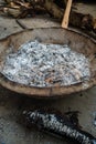 A close up shot of fire pot with ashes of wood during winter season. Uttarakhand India Royalty Free Stock Photo