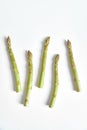 Close-up shot of five asparagus sprigs