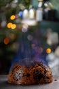 Close up shot of a flambed Christmas pudding Royalty Free Stock Photo