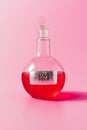 close-up shot of flask with red colored love potion Royalty Free Stock Photo