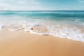 A close-up shot of gentle waves caressing the shore on a pristine sandy beach Royalty Free Stock Photo