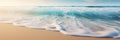 A close-up shot of gentle waves caressing the shore on a pristine sandy beach Royalty Free Stock Photo