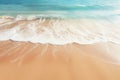 A close-up shot of gentle waves caressing the shore on a pristine sandy beach Royalty Free Stock Photo