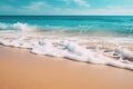 A close-up shot of gentle waves caressing the shore on a pristine sandy beach Royalty Free Stock Photo