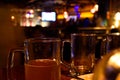 Close up shot of glass of beer on a blurry pub background. Selective focus Royalty Free Stock Photo