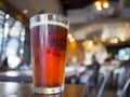 Close up shot of a glass of cold beer