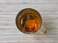 close up shot of a glass of iced tea on the table. Top view. Royalty Free Stock Photo