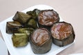 Close-up shot of the Glutinous Rice Cakes or nian gao in Mandarin on the white ceramic plate.