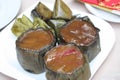 Close-up shot of the Glutinous Rice Cakes or nian gao in Mandarin on the white ceramic plate.